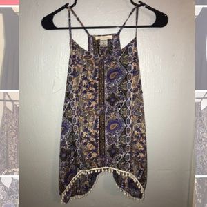 Flowy purple halter-style tank top.